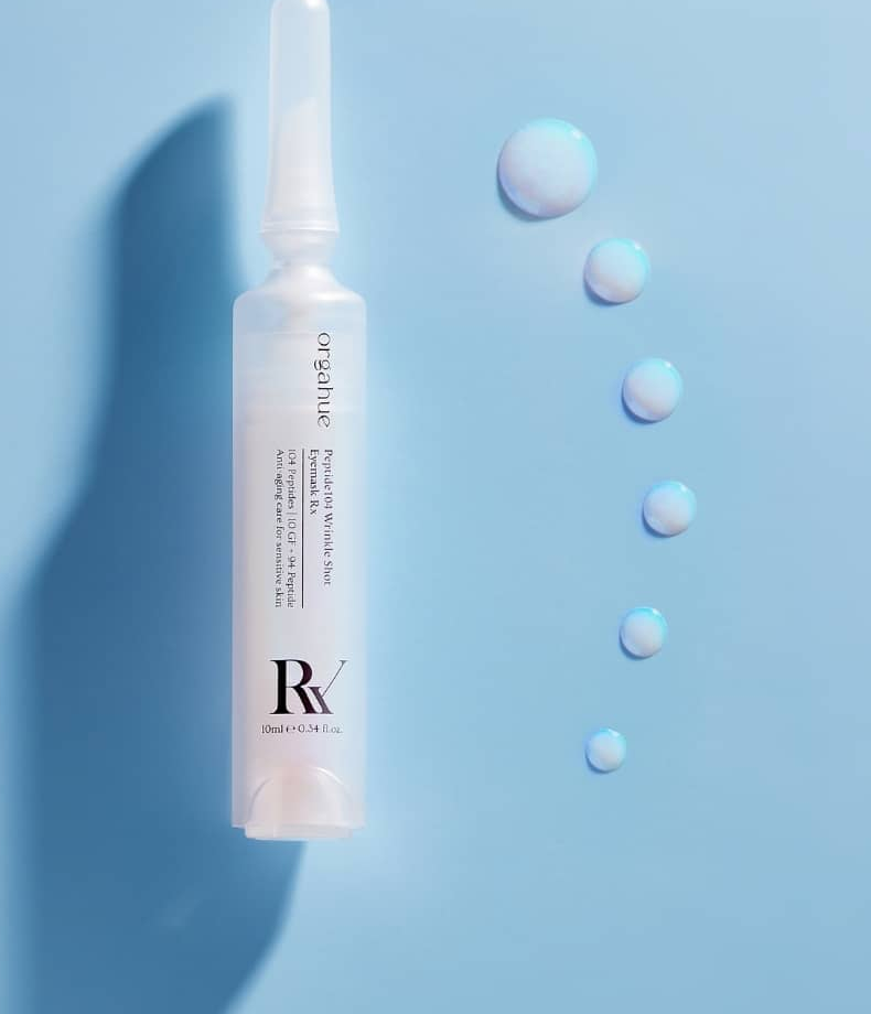 ORGAHUE Peptide 104 ampoule with iridescent aurora serum droplets